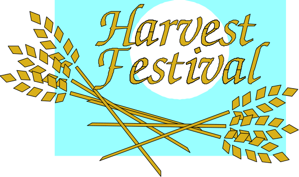 The image shows a sign with text that reads "Harvest Festival" on it, accompanied by an illustration of wheat stalks at either end.