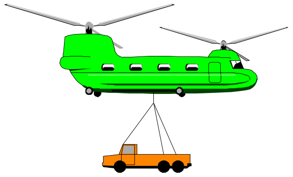 The image shows a green helicopter with two windows on top parked next to an orange truck under dark skies at nighttime in what appears to be a desert environment.