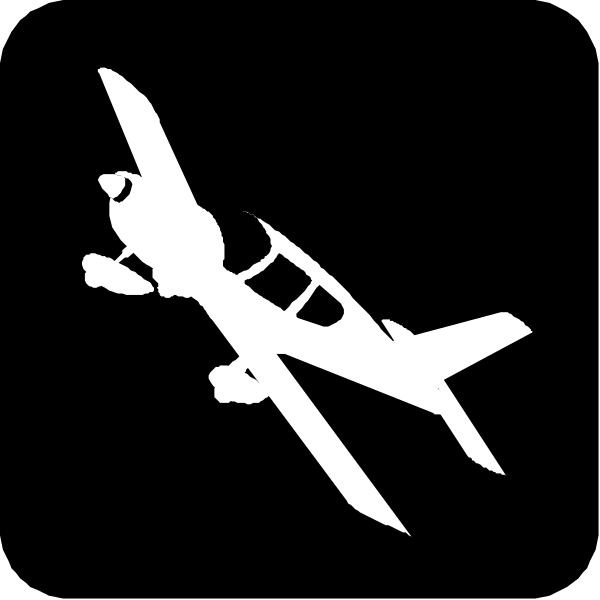 The black and white silhouette of a plane flying over an airplane model on display.