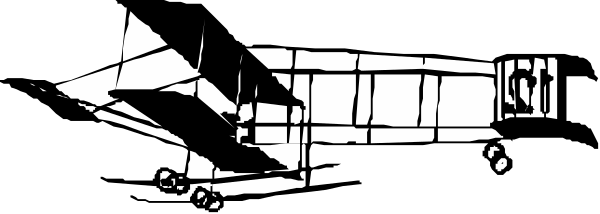 The black and white photo shows a train on tracks with buildings nearby.