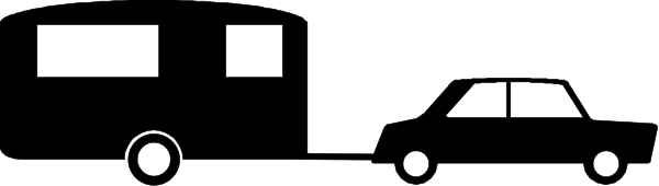 The black and white photo shows a long line of cars on an empty road at night with no visible landmarks to indicate location.