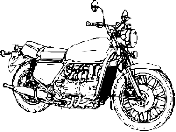 The black and white photo shows a motorcycle with saddlebags parked on what appears to be an asphalt surface at nighttime.