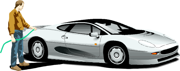 The image shows a man standing next to two sports cars on an asphalt surface with his hand outstretched towards them; he is wearing blue jeans and has short hair.