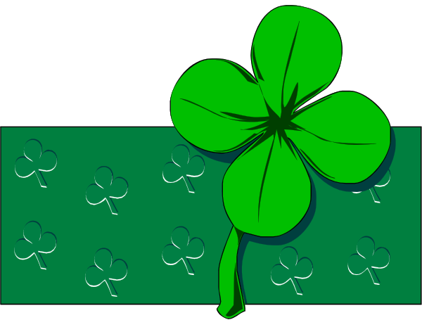 A large green four-leaf clover in front of a green rectangular banner decorated with smaller outlined clover shapes.