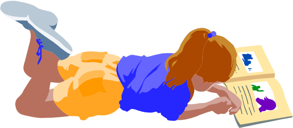 The image shows a child lying on their stomach while reading an open book with colorful pages.