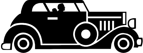 The image shows a black and white line drawing of an old train car with wheels on top.