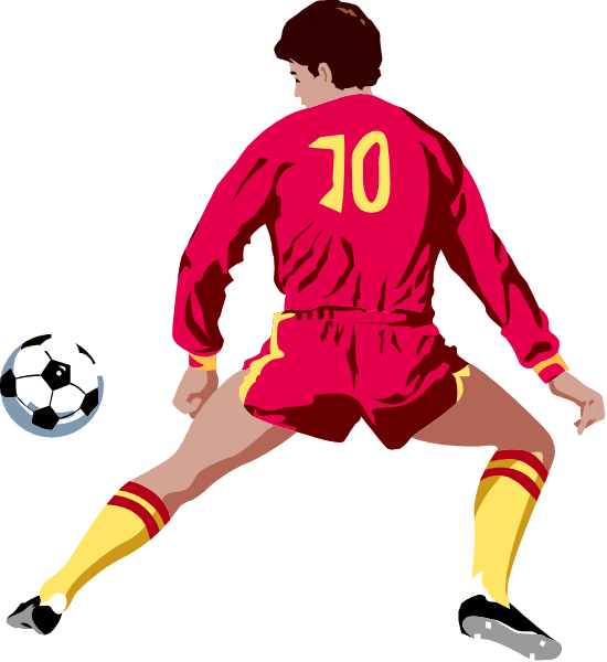 The illustration depicts a soccer player wearing red shorts with yellow stripes on his legs while kicking a ball during an indoor game of football in front of spectators who appear to be cheering for him.