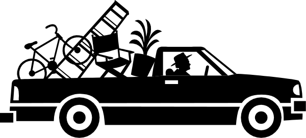 The black and white photo shows a car with two wheels visible on its left side against an indistinct background that does not provide any additional context about location or time of day.