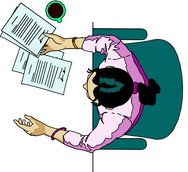 The image shows a person sitting at an office desk with papers spread out on it; there is also another paper lying next to them that appears to be in focus due to its larger size compared to other items around, and this sheet of paper has text written across it which seems like notes or writing.