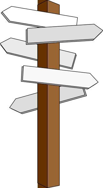 The image shows a collection of directional signs on top of each other forming an arrow shape against a dark background with no additional context provided about location or environment.