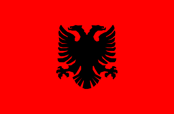 The flag of Albania with a coat of arms design on it.
