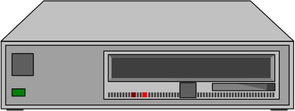 The image shows a computer monitor with an old video game console on top of it.