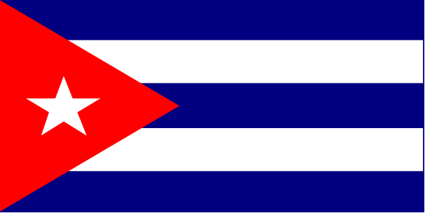 The flag of Cuba with a red star on it flying against a gray sky background.