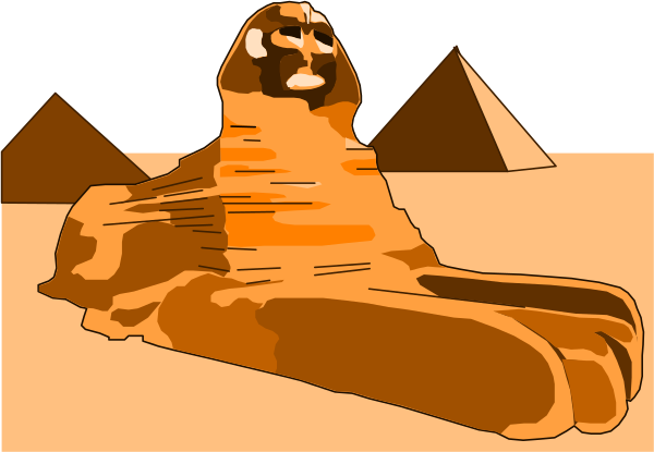 The image shows a cartoon depiction of an ancient Egyptian sphinx sitting on top of what appears to be a hot dog bun in front of a desert landscape with sand dunes under a clear sky, and there is no text present within this small clip-art illustration.