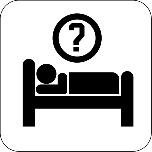 The image shows a question mark on top of an unidentified object with black background.