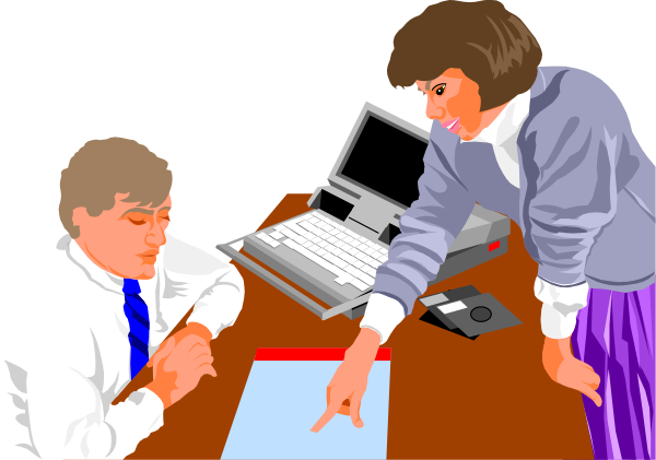 The image shows a man sitting at a desk with papers on it, looking up from his work to interact with another person who is standing beside him holding out an object towards him while gesturing animatedly.