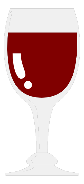 The image shows a glass of red wine with white foam on top placed next to an iconic black and white checkered flag in front of it.