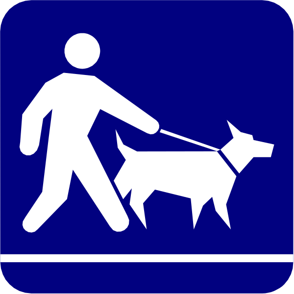 The image shows a person walking their dog on a leash along an outdoor pathway with signage indicating that dogs must be kept under control by being either in a carrier or on a short lead; there is also a blue and white "no smoking" symbol present, suggesting it's not allowed.