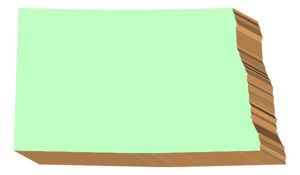 The image shows a green piece of paper with brown edges on top of what appears to be an orange surface.