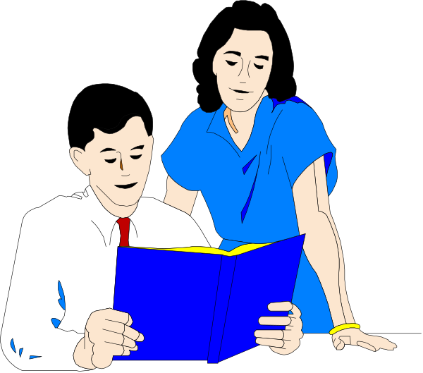 The image shows a man sitting at a table with an open book on it while another person stands behind him holding what appears to be papers; both individuals seem engaged in reading or studying material together.
