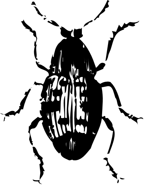 The black and white photo shows a blurry figure of an object with multiple parts that resemble teeth on top against a dark background.