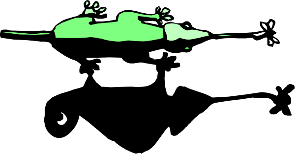 The image shows a black and white photo of an object with green highlights on it against a dark background.