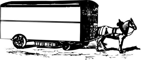 The black and white photo shows a person sitting on top of an object that resembles a car with wheels attached to it in what appears to be a room filled with various objects such as bookshelves and other items, suggesting this could possibly represent someone's living space or office area where they have their belongings.