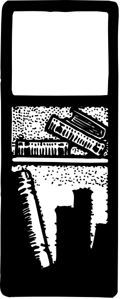 The image shows a black and white photo of an old book with its pages open to reveal text inside; it is placed on top of another object that appears to be a small box containing various items such as scissors, pens, and possibly other office supplies or tools.