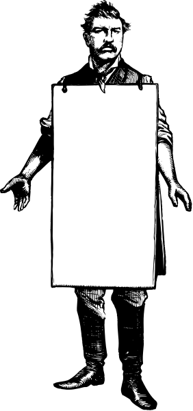 The black and white photo shows a man standing next to an empty signboard with his back turned towards it; he is wearing boots and has facial hair.