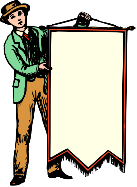 The image shows a man holding up an empty sign with his left hand while standing on what appears to be a stage set against a dark background.