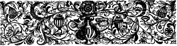The image shows a black and white pattern with various shapes that resemble abstract designs on what appears to be fabric or paper.