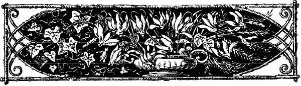 The black and white photo shows a decorative metalwork piece with intricate patterns resembling an old-fashioned scroll design on its sides; it appears to be part of a larger object that could possibly serve as trim, such as for furniture or architectural detailing.