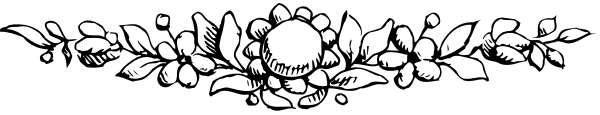 The black and white photo shows a floral border with leaves at each end on top of what appears to be an object that could possibly be a cake stand due to its shape but is unclear in detail.