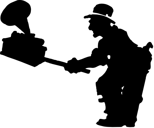 The image shows a black screen with two white dots on it against an indistinct background that appears to be darker than the rest of the frame.