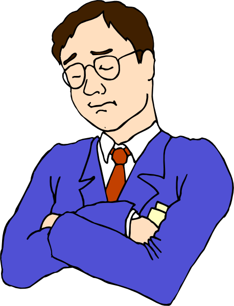The cartoon shows a man with glasses wearing a suit standing against a dark background; he has his arms crossed over himself in front of him while looking to one side.