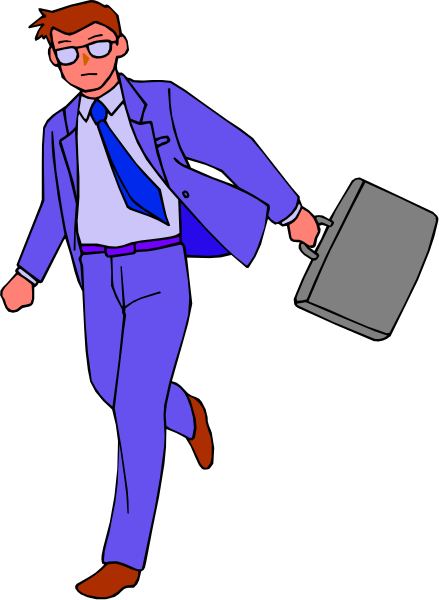The image shows a man dressed as an office worker walking with his briefcase on what appears to be a city street at nighttime.