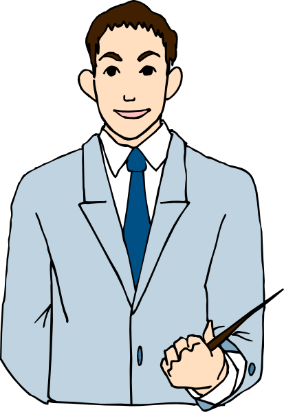 The image shows a man standing behind a desk with his hand on it; he is wearing glasses, has dark hair, and appears to be smiling slightly while looking at something off-camera. He's dressed in business attire including a blue tie over a white shirt paired with gray pants.