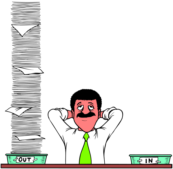 The cartoon shows a man with his hands on his head atop papers that say "out" sitting behind an office desk in what appears to be a classroom environment; he is wearing glasses and has short hair, dressed casually in blue jeans and no tie or shirt visible beneath them.