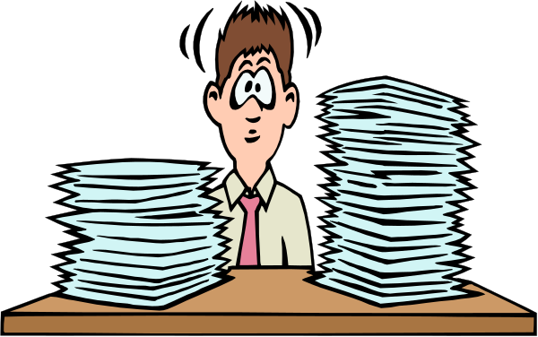 The cartoon shows a man standing behind two stacks of papers on his desk with another stack nearby; he is wearing glasses and has short hair.