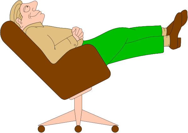 The image shows a man sitting on an office chair with his feet up resting against another piece of furniture that resembles a desk; he is wearing glasses and appears to be relaxed in this pose.