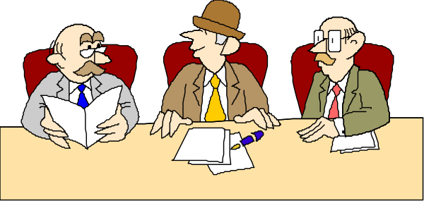 The cartoon depicts three men sitting at a table with papers before them; two of them have glasses on their heads while one is wearing a hat. They appear to be engaged in discussion as suggested by hand gestures and open books, suggesting an academic setting or meeting room environment.