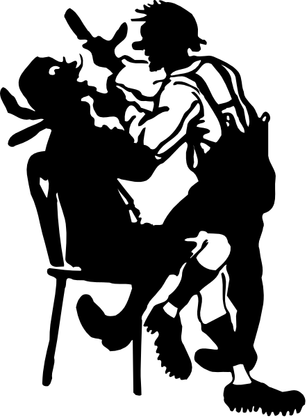 The black and white photo shows a person sitting down with their legs crossed at an angle over each other while holding onto something in front of them.