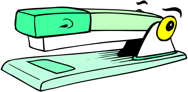 The image shows a green stapler with an eye on it placed next to what appears to be a white keyboard.