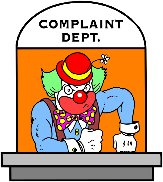 The image features a cartoon clown standing behind an orange sign that reads "COMPLAINT DEPT."