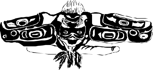 The black and white photo shows a totem pole with various animal figures on it against an indistinct background.