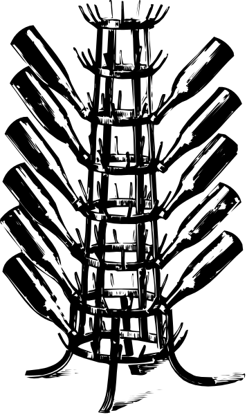 The black and white photo shows a tall tower with multiple levels of windows on each side against an indistinct background that appears to be darker at the bottom than it is towards the top.