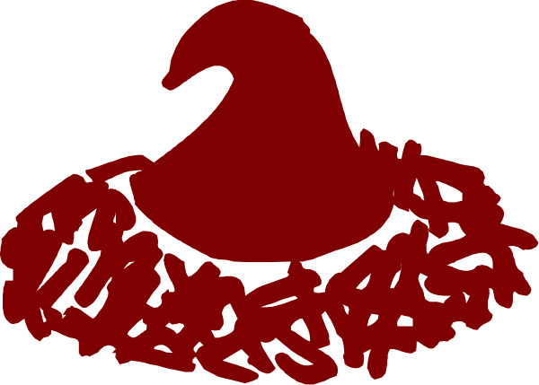 The image shows a red bird with white feathers sitting on top of an assortment of broken glass pieces that resemble snowflakes against a dark background.