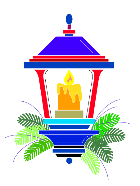 The image shows a colorful stained glass lantern with an illuminated candle inside it on top of what appears to be a small temple-like structure surrounded by plants at its base.