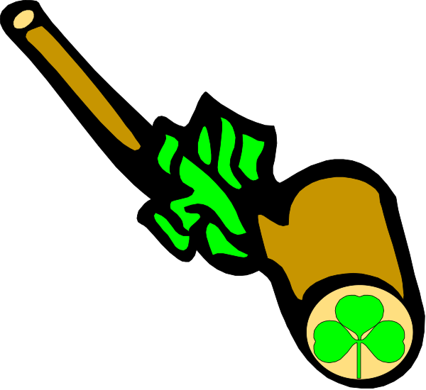 The image shows a shamrock with four leaves on it next to what appears to be an object that resembles a pipe or flute.