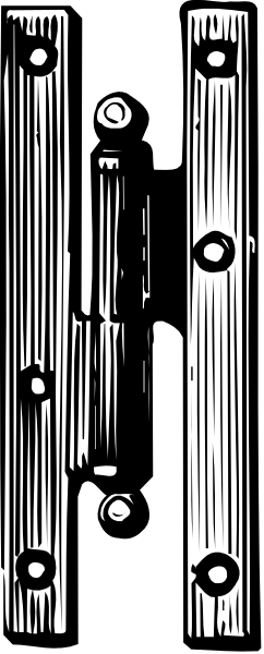 The black and white photo shows a close up of an old door handle with multiple locks on it against a dark background.